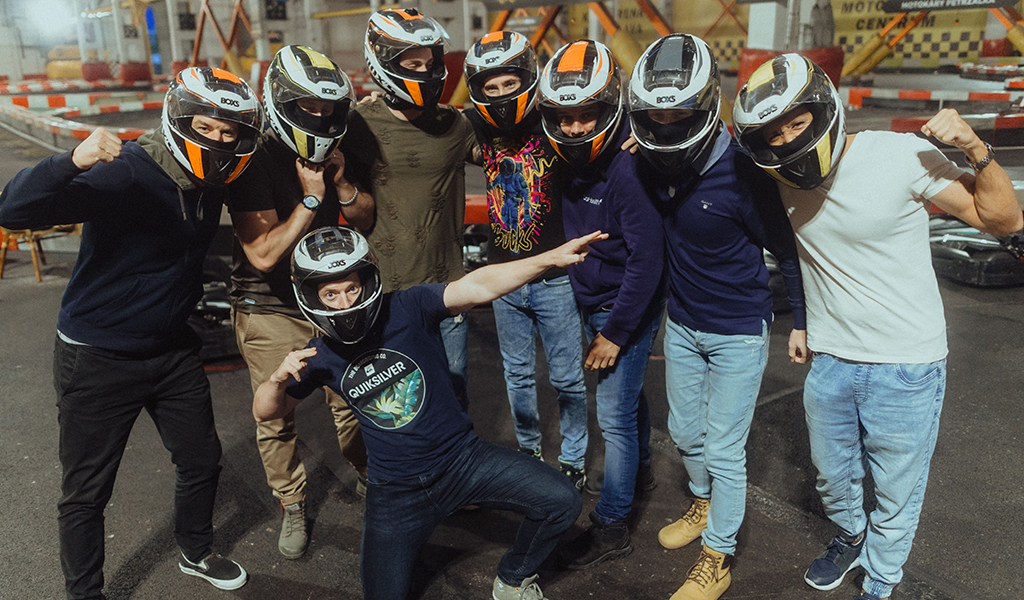 Team members of GoHealth posing in helmets
